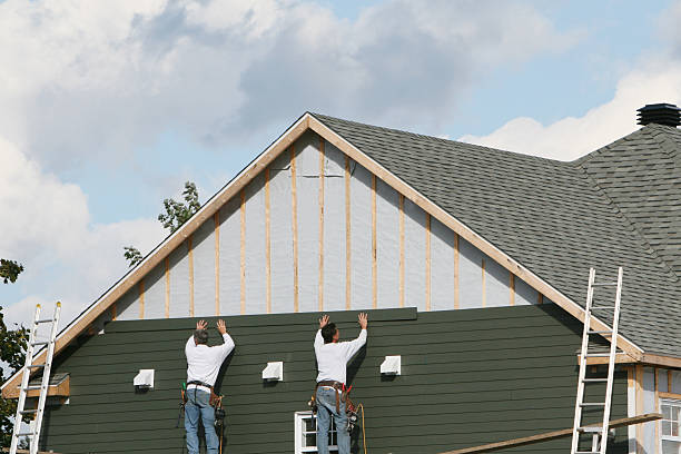 Professional Siding Repair technician working in Auburndale, MA